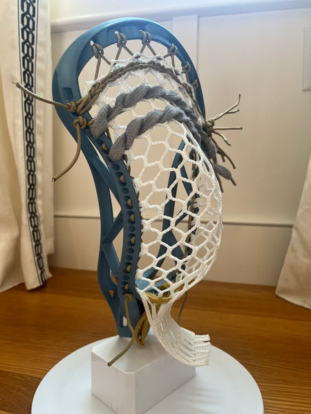 New Silverfin Camber dyed teal and strung w./ The Mesh Dynasty 7d