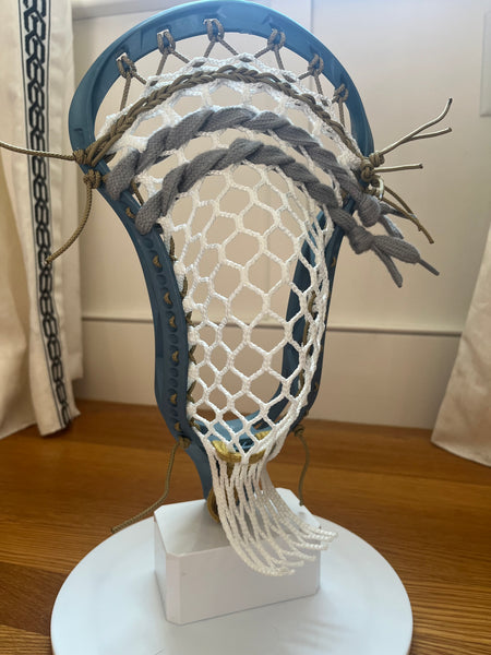 New Silverfin Camber dyed teal and strung w./ The Mesh Dynasty 7d