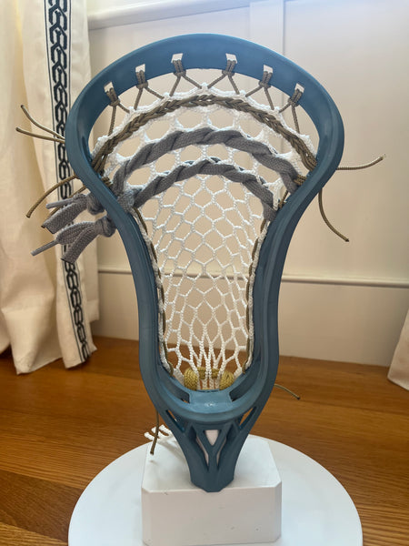 New Silverfin Camber dyed teal and strung w./ The Mesh Dynasty 7d